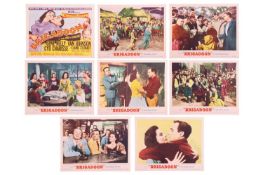 Gene Kelly: an original lobby card set (x8), from the 1954 film 'Brigadoon', starring Gene Kelly and