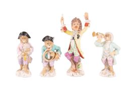 A late 19th-century Volkstedt porcelain 'Monkey Band' comprising three marked figures and one unmark