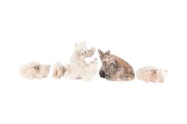 Three Royal Copenhagen porcelain figurines of polar bears including shape numbers 729 (x2) and 1107,