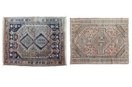 A subtle pink Afshar rug with two diamond lozenges on a pole, 270 cm x 169 cm, together with a small