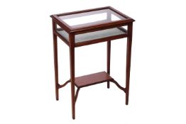 An Edwardian mahogany rectangular Bijouterie table with captive satinwood banding and stringing, sup