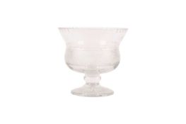 A large shaped and cut glass bowl on knopped stem and foot, unmarked, measuring 27.5 cm tall x 29 cm