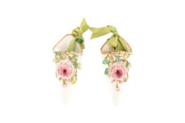Pair of Continental floral porcelain wall pockets with a blue crossed sword mark to base of one, bot