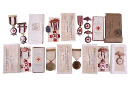 A collection of British Red Cross Society enamel medals, apparently awarded to M. Currey, the majori