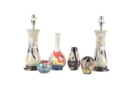 A collection of six Moorcroft pieces consisting of a Hibiscus fluted baluster vase, a Rennie Mackint