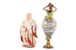 A Ginori majolica ewer, the ovoid form on a spreading foot with classical designs and applied decora