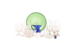 A 'Bristol blue' cream jug, three Irish glass goblets, three salt dishes, an Edwardian jug, and furt