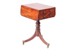 A George IV ebony strung mahogany two flap work table fitted two short frieze drawers over a central