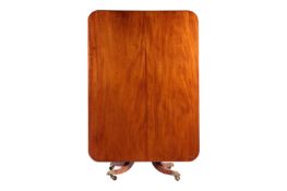 A George IV mahogany Breakfast Table, the rectangular snap top with reeded edge over a reeded balust