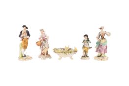 A pair of Derby porcelain figures of a bagpipe player and shepherdess, together with two further Con
