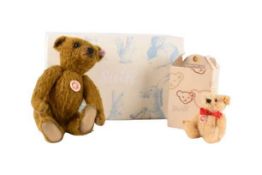 Steiff: Edward Bear, in golden green, number 13/1500, with original certificate and box, measuring 3