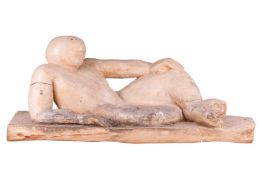 A Modern British school carved softwood sculpture of a recumbent male, initalled AD at the base, mea