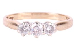 A diamond three stone ring, set with a row of round brilliant cut diamonds, with a total estimated w