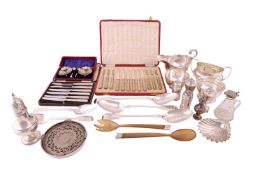 A collection of silver; including a silver sauce boat, Sheffield 1912; a two handled silver sugar bo