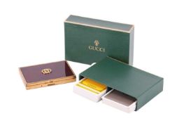 Gucci - a set of two decks of playing cards, grey and yellow deck, circa 1980s, boxed and used; toge