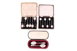 Three boxed sets of silver spoons, comprising a pair of preserve spoons by Thomas Levesley, hallmark