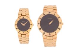 A set of matching Gucci watches Ref:3300 His and Hers.Featuring a Gucci 3300.2M with a quartz moveme