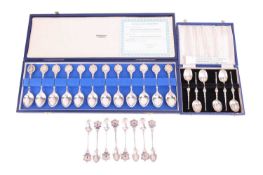 A cased set of twelve silver Zodiac teaspoons sculpted by David Cornell, by John Pinches of London 1