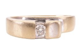A diamond single stone ring, formed from a central diamond approx 0.20cts bar set into white metal s