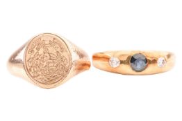 A 9 carat gold signet ring with a crest engraved to oval plaque and commemorative engraving to inter