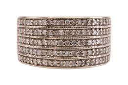 A diamond-set ring, the round brilliant diamonds claw-set in five rows, in an 18ct gold mount, laser