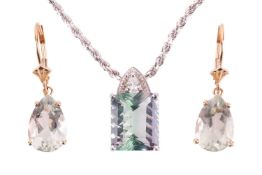 A bi-coloured fluorite pendant on a twisted rope chain together with a pair of prasiolite drop earri