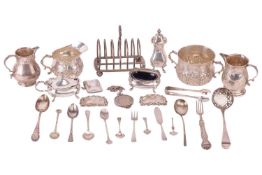 A collection of silver items; to include a set of Arts & Crafts sugar bowl and creamer by the Ma
