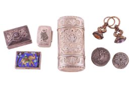 A French parcel-gilt silver vesta case; oval with hinged cover and base opening to reveal an apertur