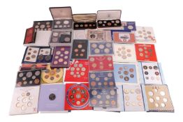 A collection of commemorative coins, proofs and bank notes including a set of 1990 brilliant uncircu