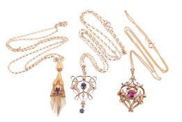 A Victorian garnet-set fringe pendant, and two other Edwardian-style pendants; the Victorian pendant