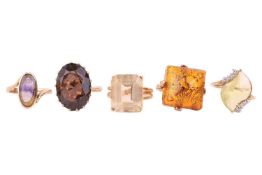 Five rings comprising a lemon quartz cocktail ring, in yellow metal tested as 18ct gold, size Q, a s