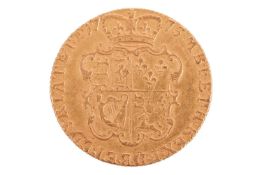 A George III 1775 full guinea, obverse with the fourth laureate head of King George III, head facing