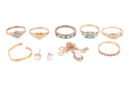 A collection of jewellery items comprising a 9ct gold CZ ring, three 9ct gold rings, a broken 22ct g