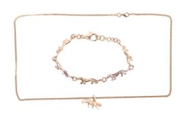 A panther bracelet and conforming pendant, the bracelet measuring approximately 18.5cm, in bi-colour