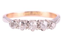 A diamond five stone ring, set with a row of old cut diamonds with a total estimated weight of 0.50c