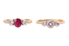 Two gem-set rings in 18ct gold; including a ruby and diamond trilogy ring, centred with an oval-cut 