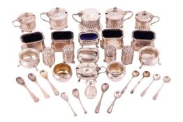 A collection of items comprising a set of four silver salts, of octagonal form with blue glass liner