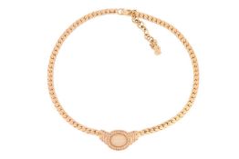 A Christian Dior necklace, featuring a melon-cut paste, bezel-set in a paste-set mount, to a gold-pl