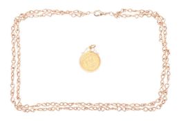 An Edward VII half sovereign coin in a 9ct gold mount with scrolled surmount, 3.0 cm drop; together 