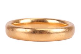A 22ct yellow gold court-shaped 4mm wedding band, size N; 7.3 grams
