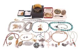 A mixed collection of costume jewellery including gold-plated bangle, a spray brooch by Monet, a pai
