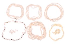 A collection of pearl necklaces, comprising four cultured pearl necklaces, one broken pearl and gem-