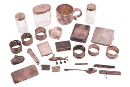 A mixed collection of silver and plate comprising a silver mug, two silver cigarette cases, a silver