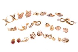 A collection of yellow metal earrings, some marked '9ct', including a pair of cameo-set earrings, a 