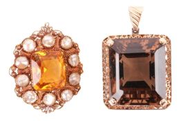A gem-set pendant, the octagonal-cut smoky quartz measuring approximately 23mm x 19.5mm, in a yellow