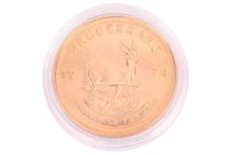A 1oz 22ct gold South Africa Krugerrand, 1974, encapsulated