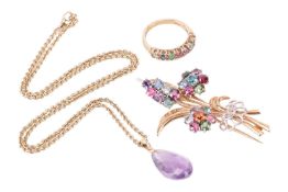A multiple gem-set spray brooch, claw-set with various gemstones in clusters, including examples of 