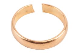A wedding band in 22ct yellow gold, with D-profile, pierced open and needs to be repaired, Birmingha