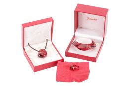 Baccarat - a red 'Galet' pendant on cord, a red 'Galet' open cuff bangle, and a red 'Médicis' dome r
