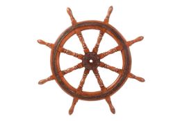 A large 20th century, teak, eight-spoke ship wheel with black iron insert, diameter 104 cm Dawsons a